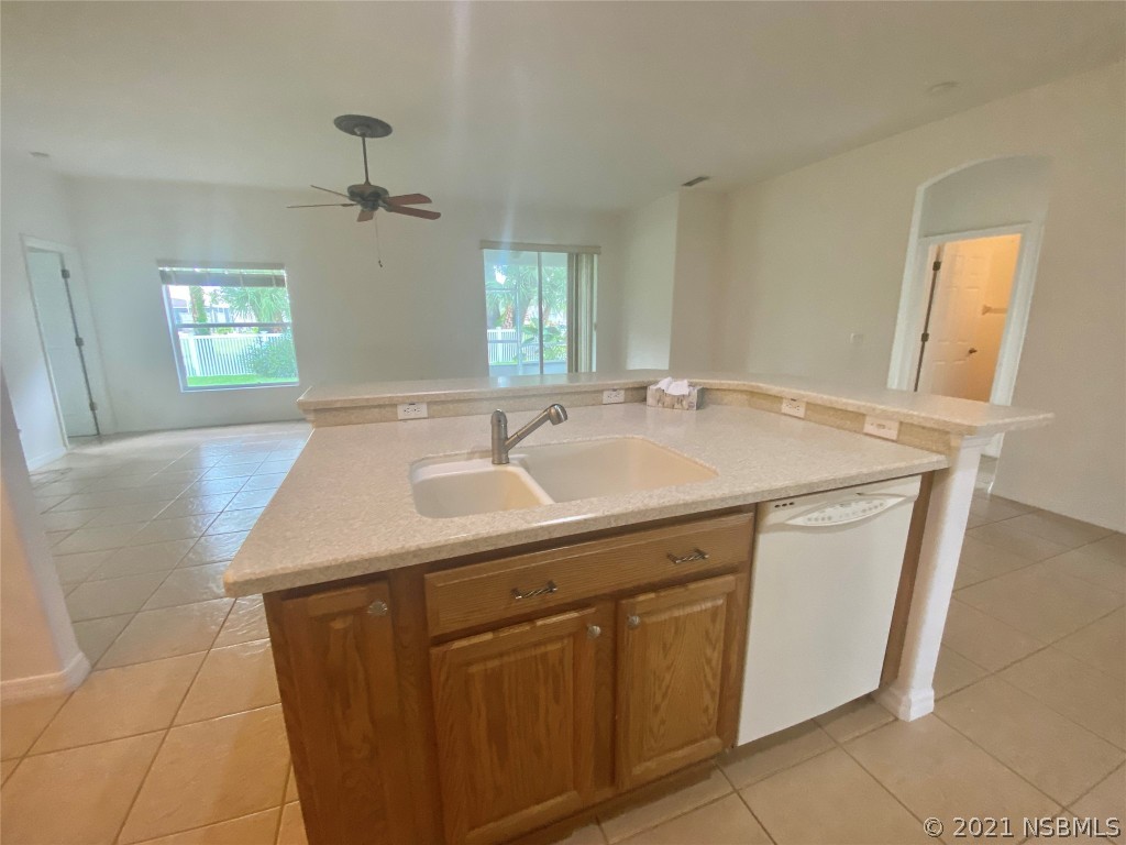 339 Mariners Gate Drive Edgewater, FL 32141 - Photo 20 of 30 a utility room with sink dryer and washer