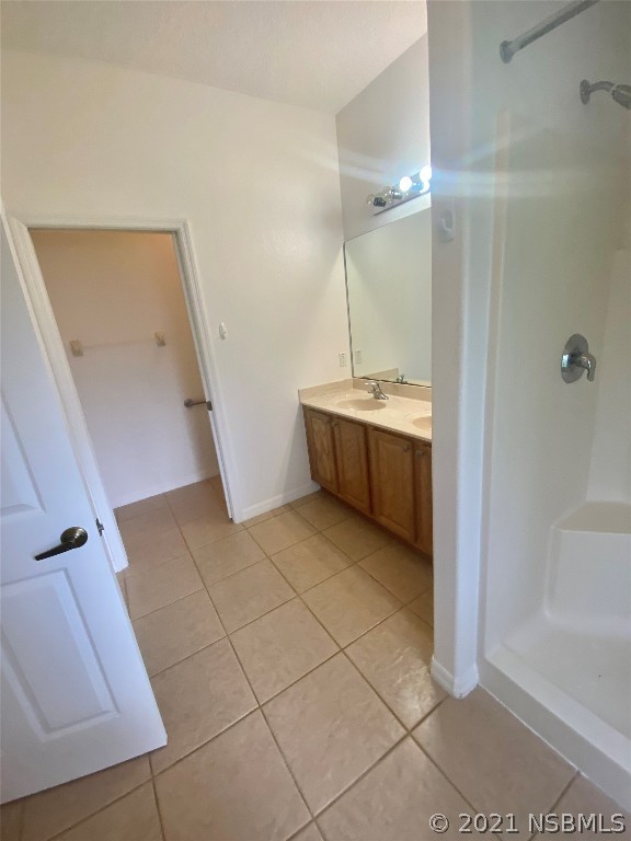 339 Mariners Gate Drive Edgewater, FL 32141 - Photo 25 of 30 a bathroom with a sink a toilet and shower