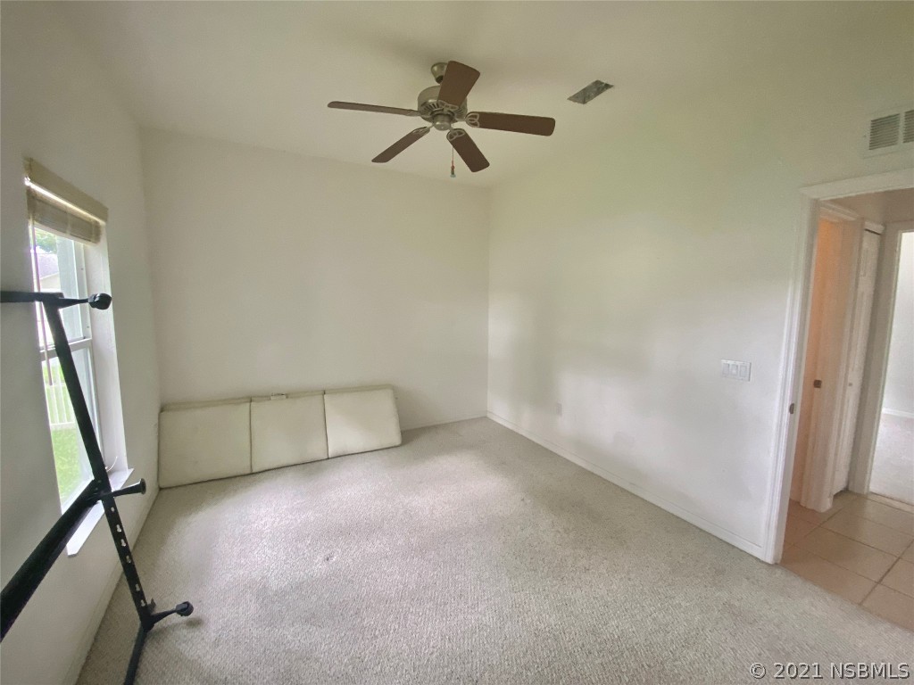 339 Mariners Gate Drive Edgewater, FL 32141 - Photo 28 of 30 an empty room with windows