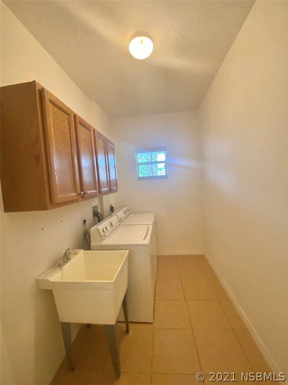 339 Mariners Gate Drive Edgewater, FL 32141 - Photo 30 of 30 a bathroom with a sink a toilet and mirror