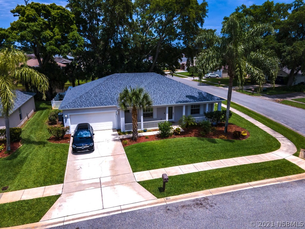 339 Mariners Gate Drive Edgewater, FL 32141 - Photo 4 of 30 a front view of house with yard and green space