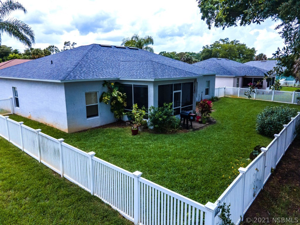339 Mariners Gate Drive Edgewater, FL 32141 - Photo 6 of 30 a view of a house with garden