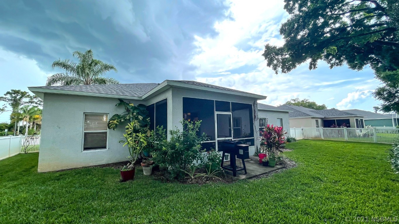 339 Mariners Gate Drive Edgewater, FL 32141 - Photo 7 of 30 front view of house with a yard