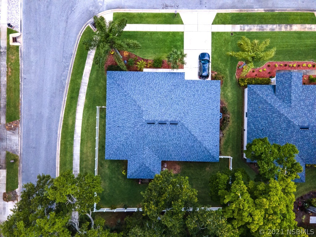 339 Mariners Gate Drive Edgewater, FL 32141 - Photo 9 of 30 an aerial view of a house with a yard and outdoor seating