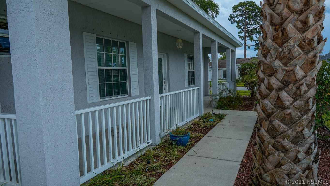 339 Mariners Gate Drive Edgewater, FL 32141 - Photo 10 of 30 a view of a pathway of a house with a yard