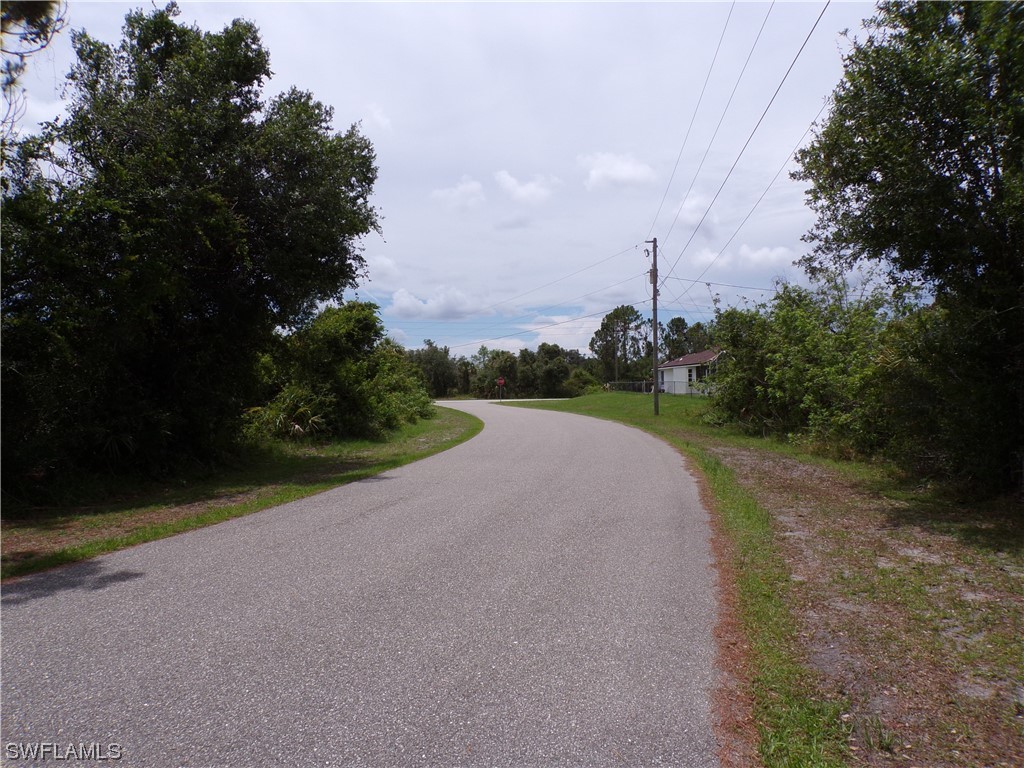 Embassy Rd Port North Port, FL 34291 - Photo 9 of 12 a view of a road with a yard