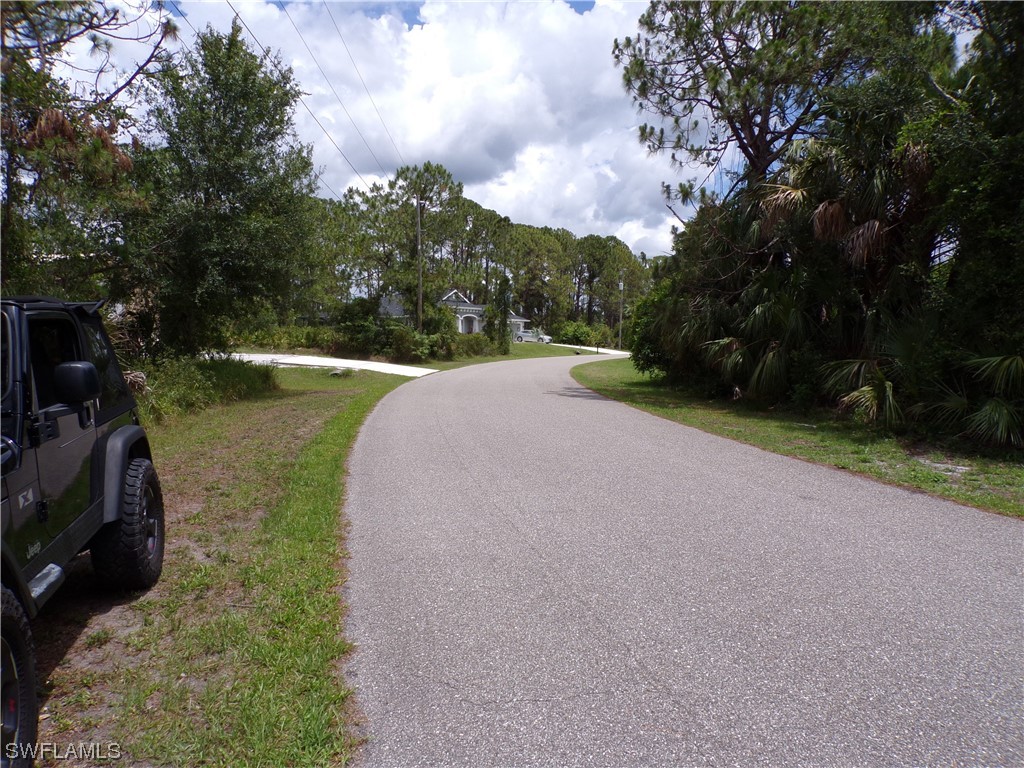 Embassy Rd Port North Port, FL 34291 - Photo 10 of 12 a view of a lake with a big yard