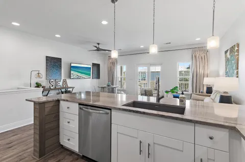 a kitchen with lots of counter space and a sink