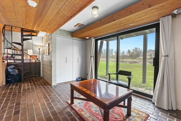 a living room with furniture and a table