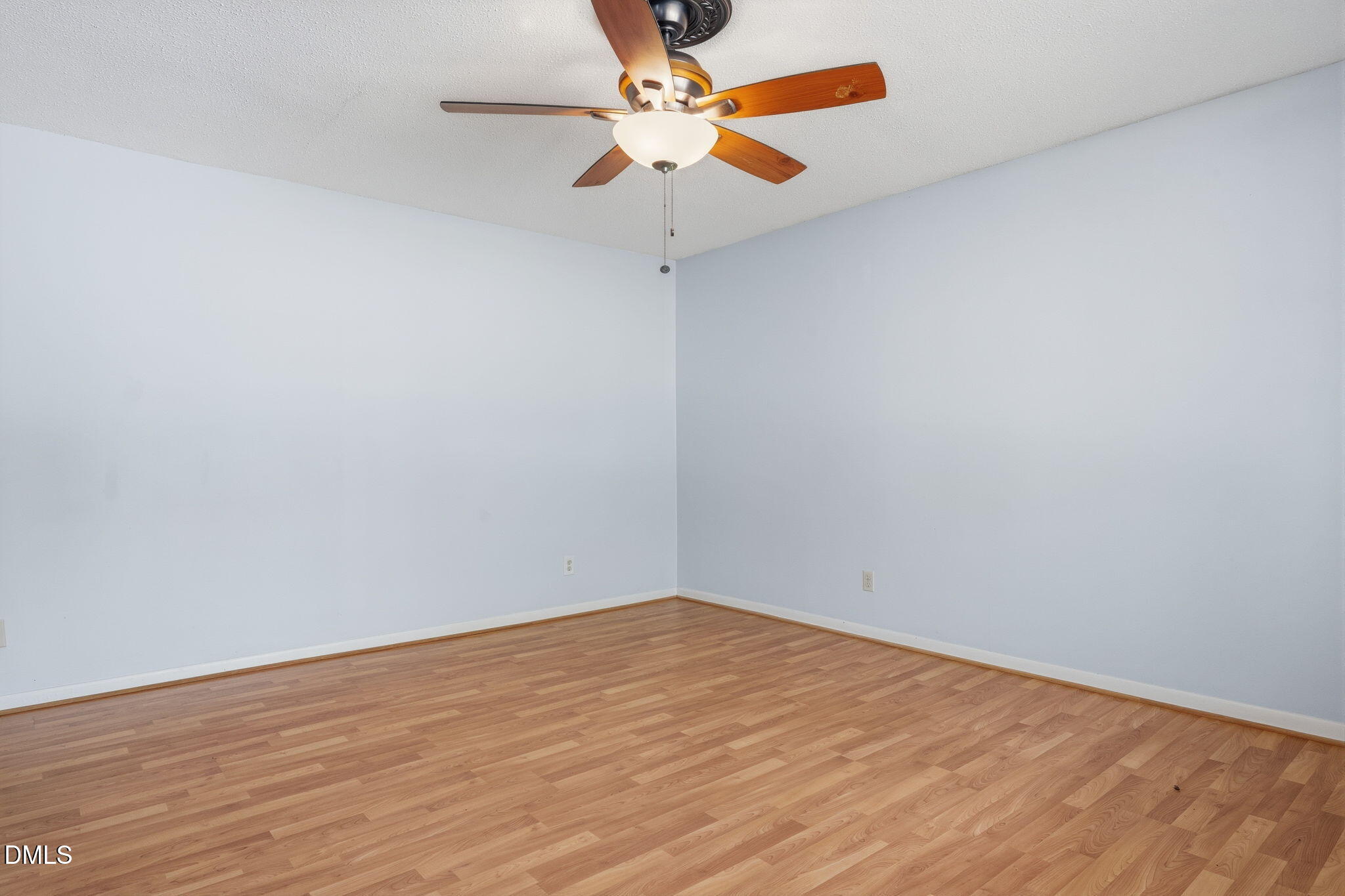 511 Hunter Street Durham, NC 27712 - Photo 11 of 30 a view of an empty room with a ceiling fan
