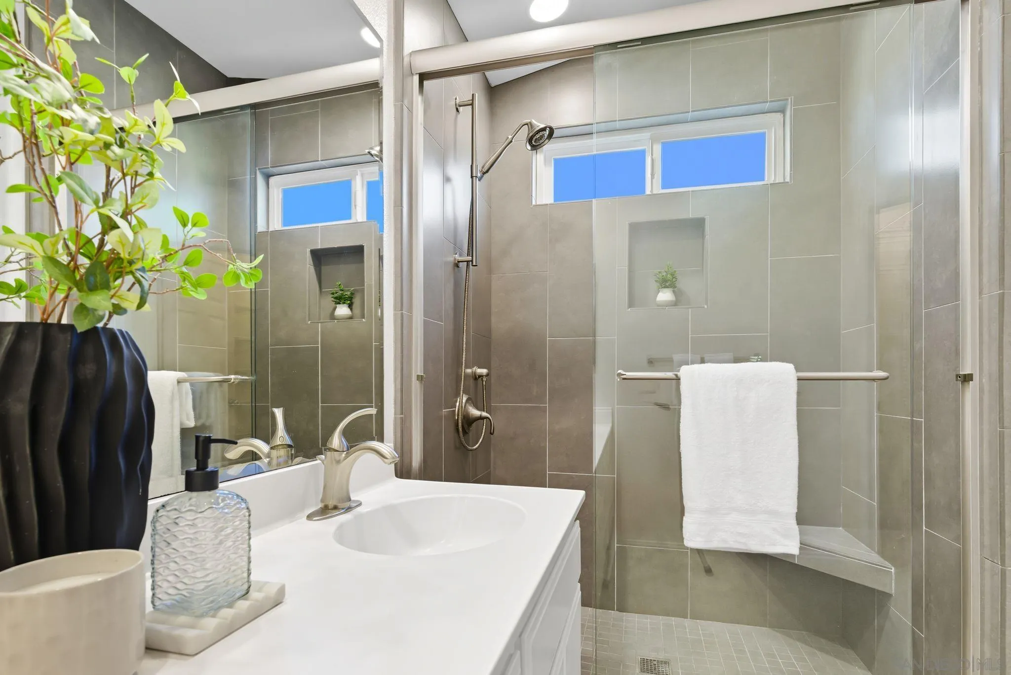 1802 Key Largo Road Vista, CA 92081 - Photo 15 of 24 a bathroom with a granite countertop bathtub shower sink and toilet