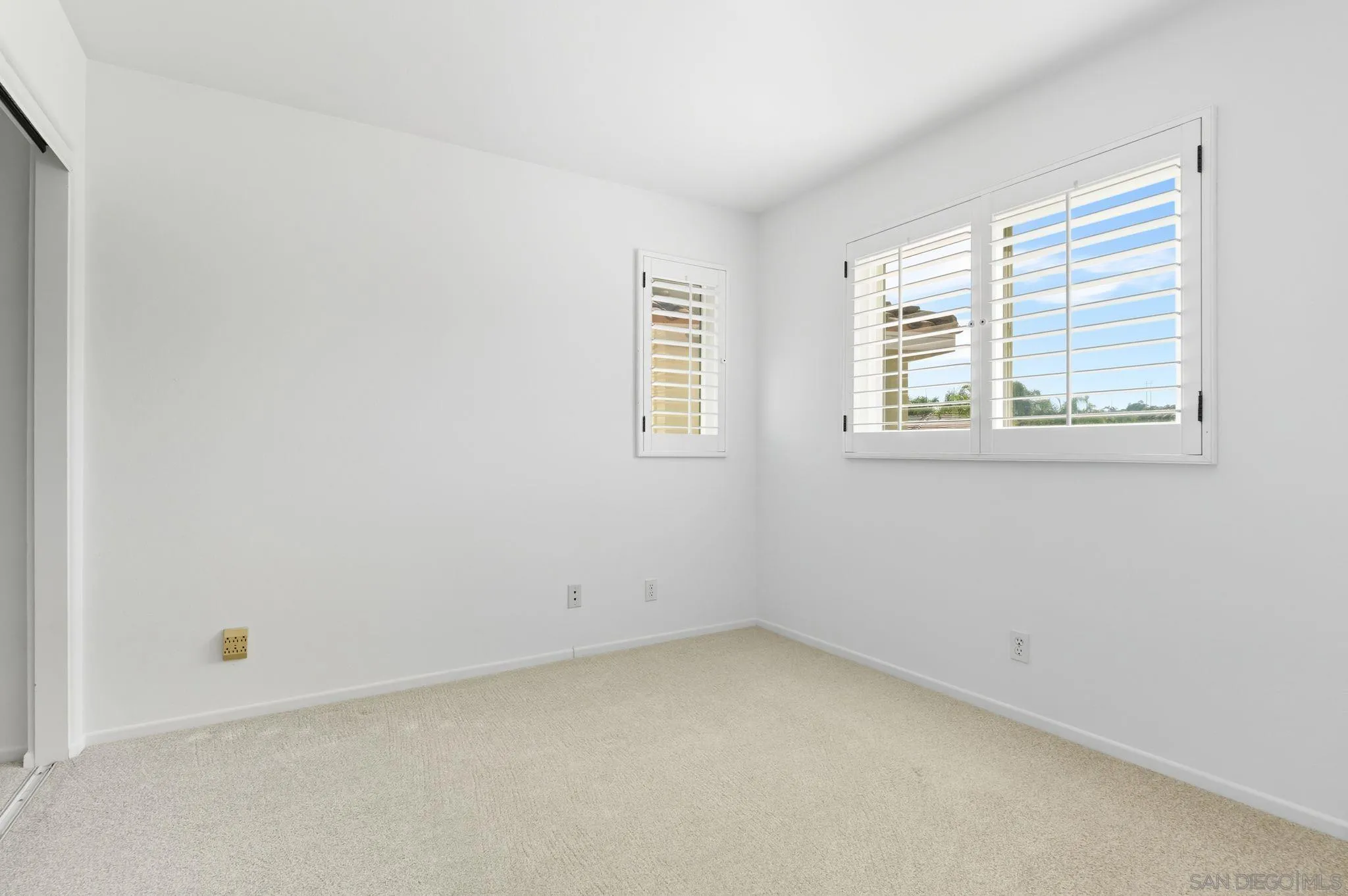 1802 Key Largo Road Vista, CA 92081 - Photo 17 of 24 an empty room with a window