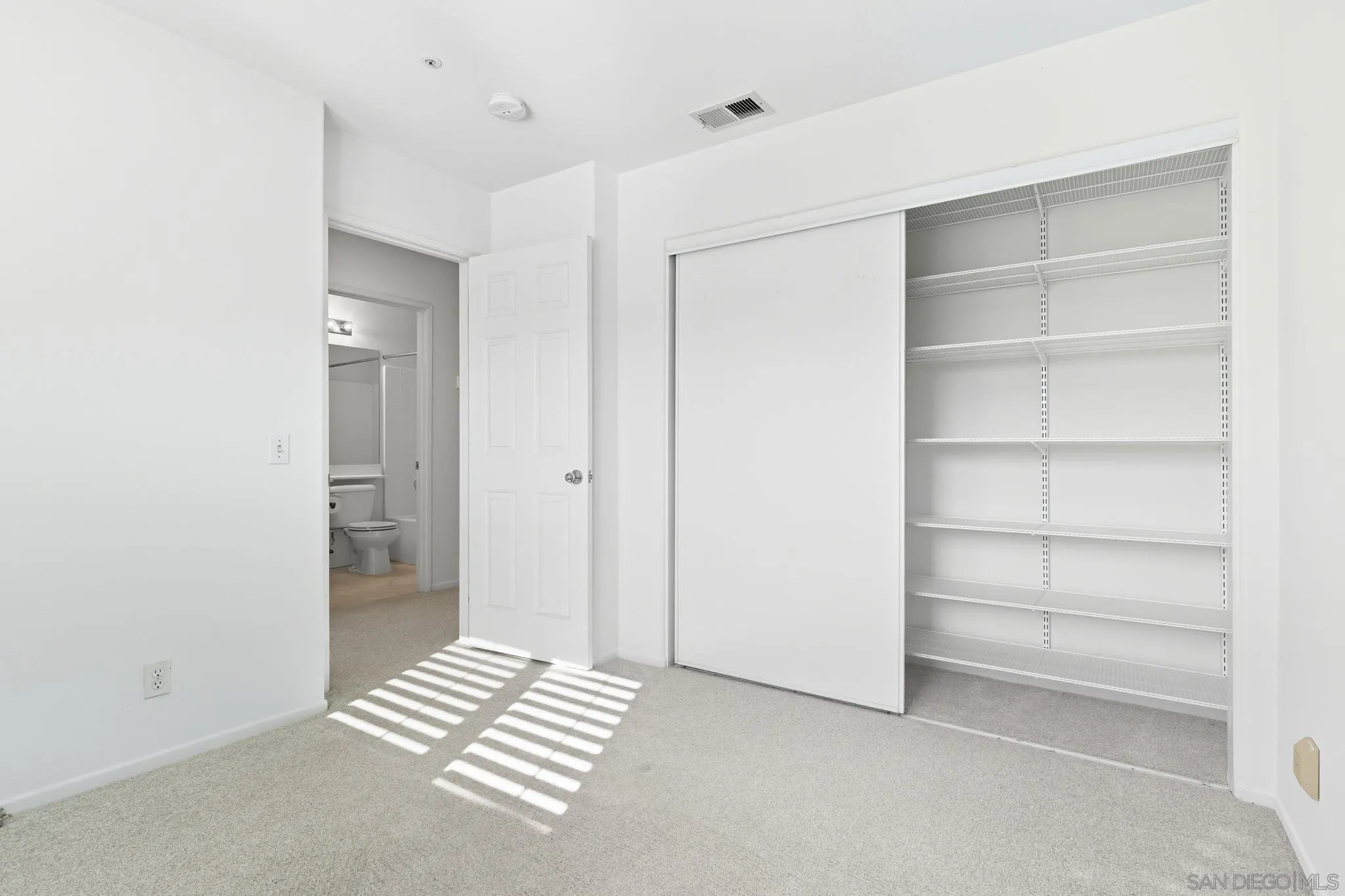 1802 Key Largo Road Vista, CA 92081 - Photo 18 of 24 a view of room with walk in closet and bathroom