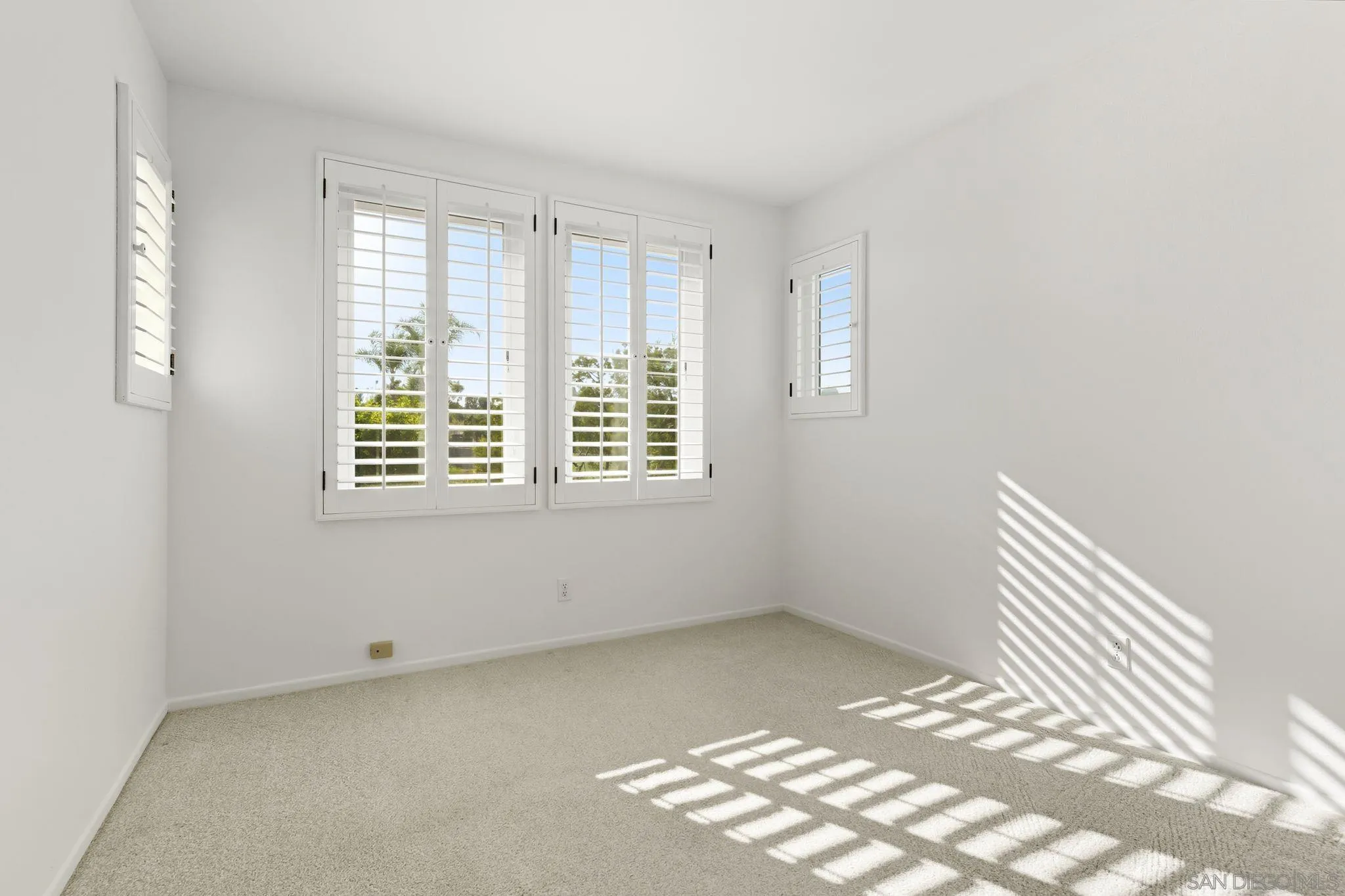 1802 Key Largo Road Vista, CA 92081 - Photo 19 of 24 an empty room with windows