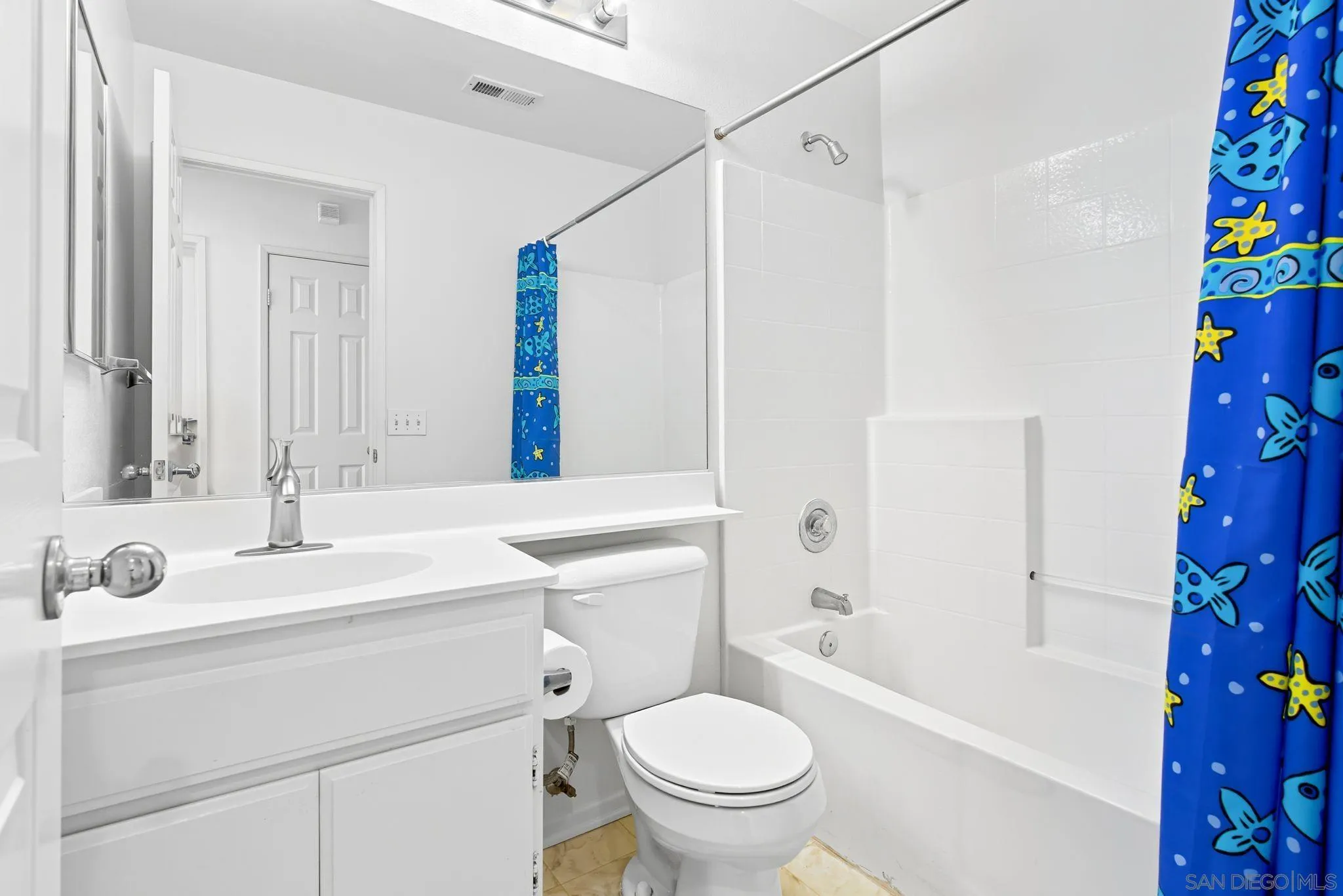 1802 Key Largo Road Vista, CA 92081 - Photo 21 of 24 a bathroom with a sink toilet and shower