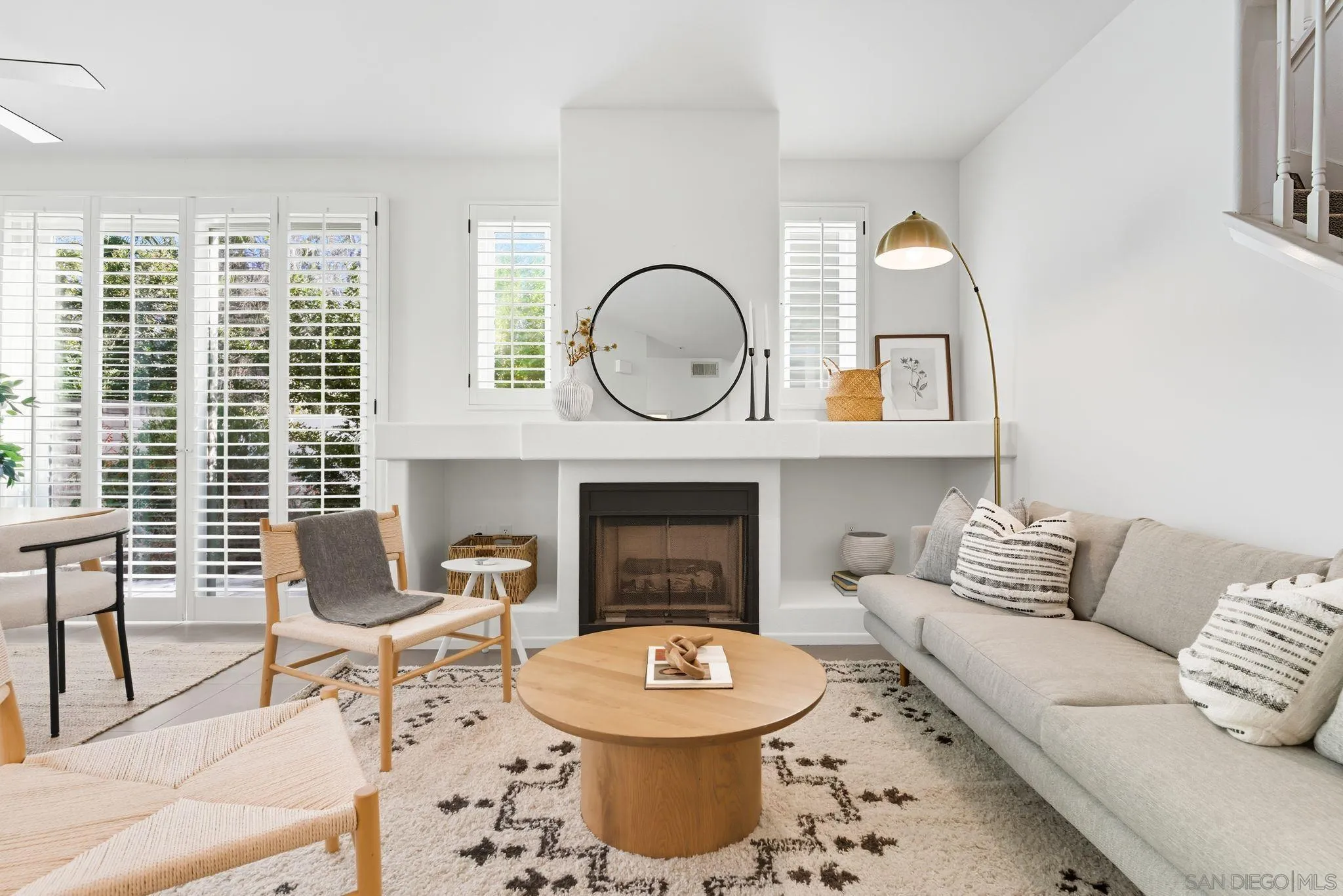 1802 Key Largo Road Vista, CA 92081 - Photo 3 of 24 a living room with furniture a fireplace and a large window