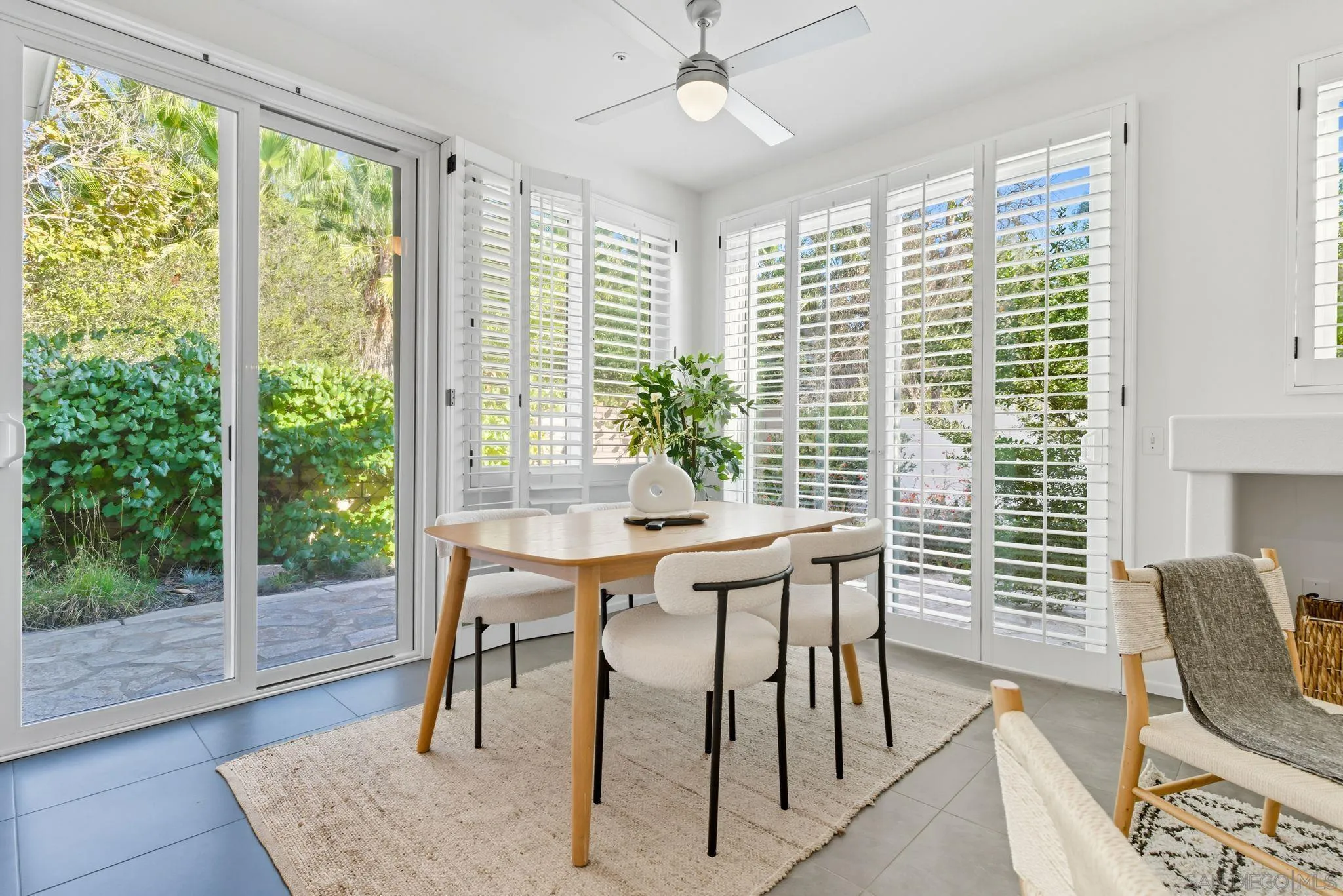 1802 Key Largo Road Vista, CA 92081 - Photo 4 of 24 a view of a dining room with furniture window and wooden floor