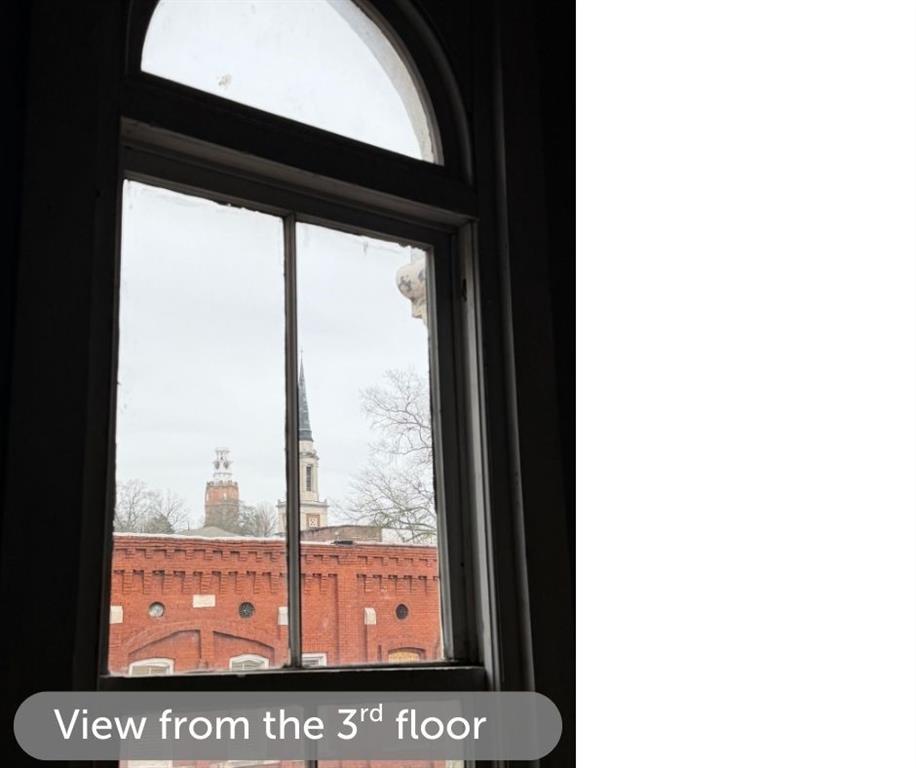 8 East 3rd Avenue Rome, GA 30161 - Photo 13 of 19 a picture of a bench in the window