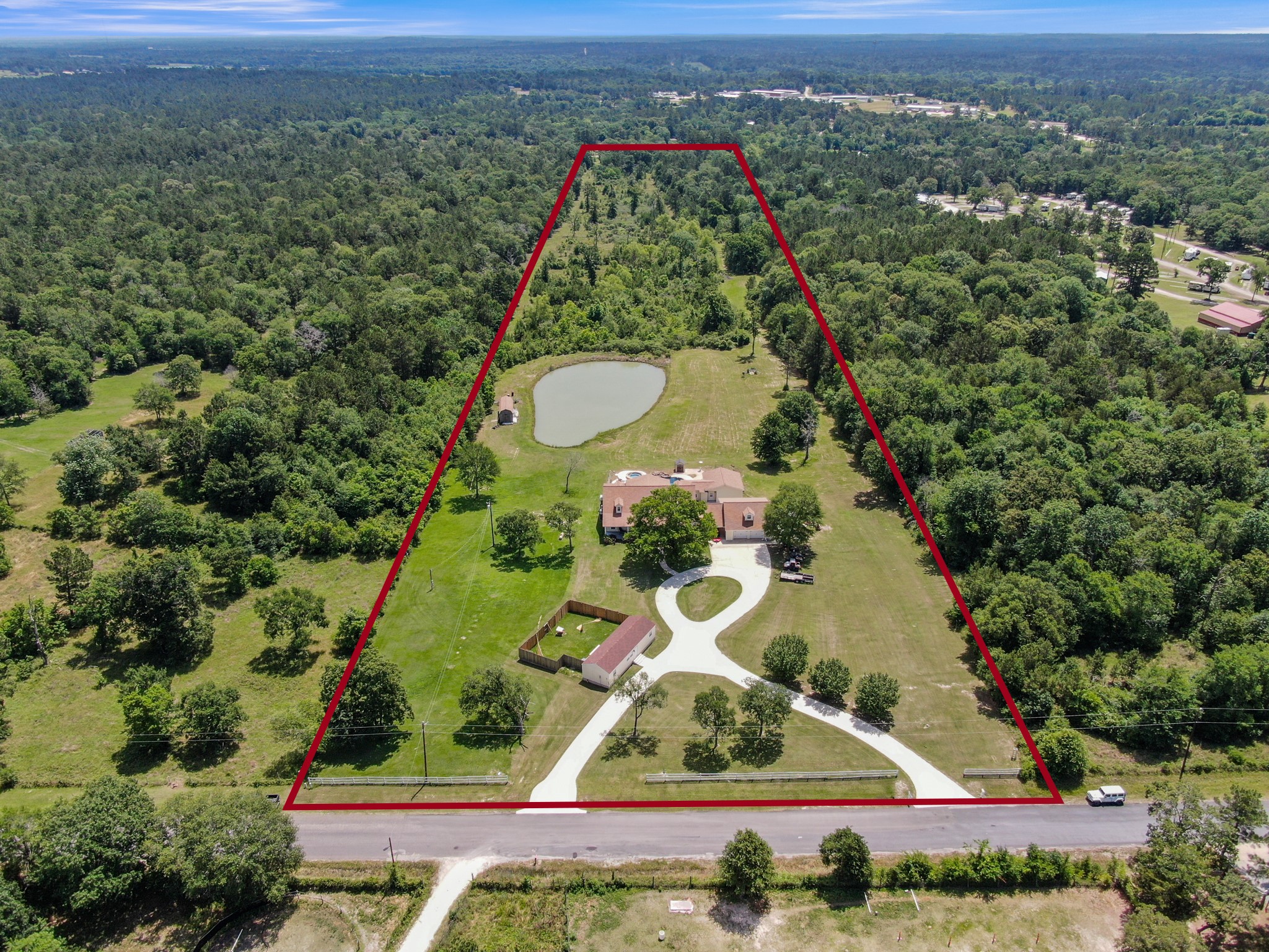 144 Wood Farm Road Huntsville, TX 77320 - Photo 35 of 35 an aerial view of a house