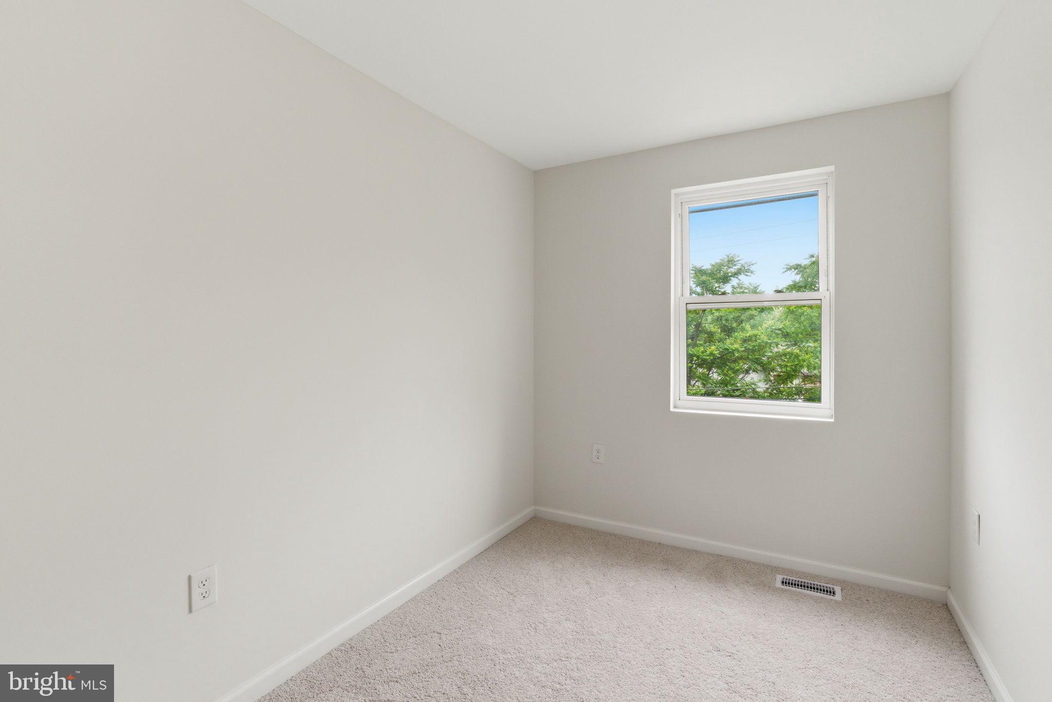 4111 Roland View Avenue Baltimore, MD 21215 - Photo 8 of 19 Bright and airy room with a view.