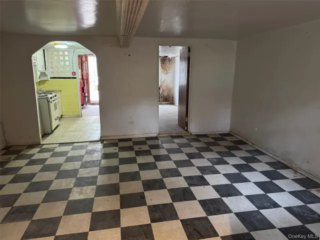 a black and white checkered floor with a black white checkered floor
