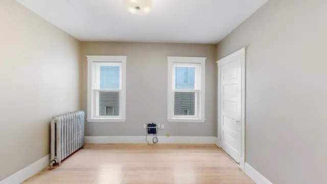 a view of entryway with wooden fence