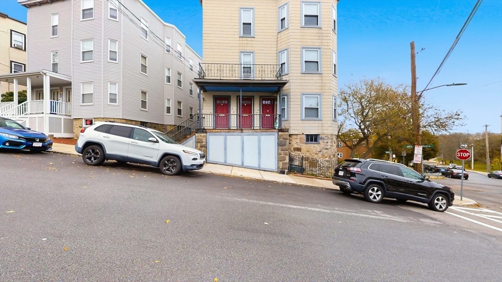 1 Orient Avenue, Unit 3C Boston, MA 02128 - Photo 24 of 25 a view of a car parked in front of a building