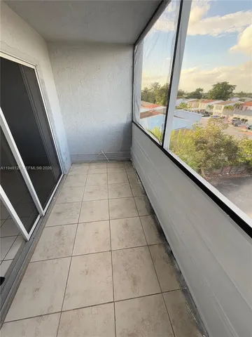 a view of a lake from a balcony