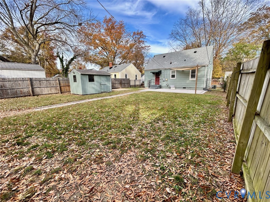 910 Forest View Drive Richmond, VA 23225 - Photo 19 of 23 a front view of a house with a large tree