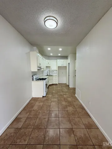 a view of empty room with windows