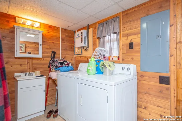 a utility room with dryer and washer