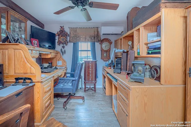 a view of backyard with outdoor seating a patio and plants