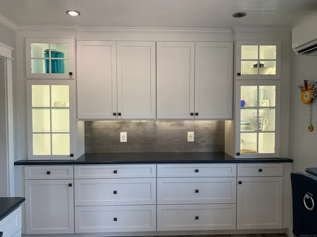 a view of cabinets and window