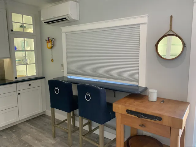 a view of a livingroom with furniture