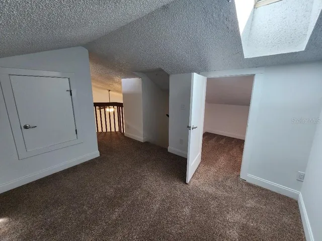 a view of a hallway with entryway