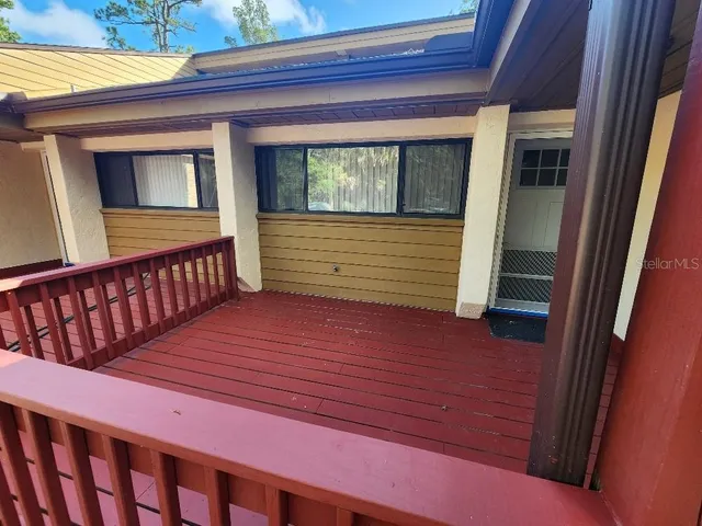 a view of a balcony with door
