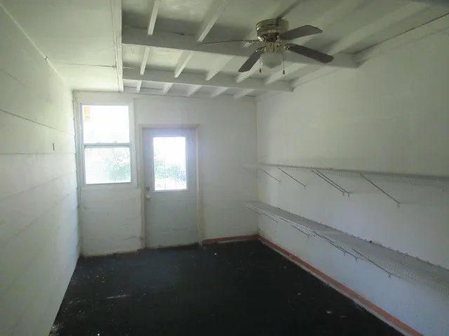 a view of a room with racks on the wall