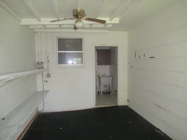 a utility room with a sink washer and dryer