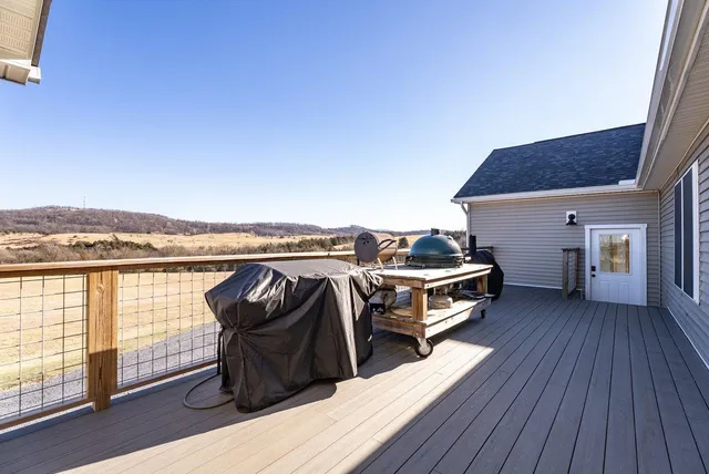 a view of a house with large windows