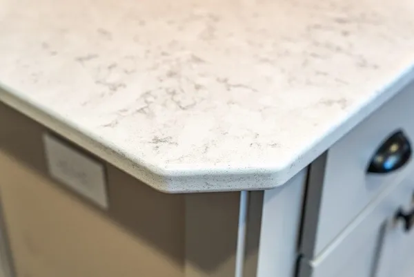 a spacious bathroom with a double vanity sink a mirror and a bathtub