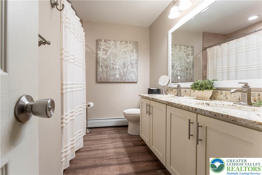 345 South Whitfield Street Nazareth, PA 18064 - Photo 12 of 29 a bathroom with a double vanity sink and mirror
