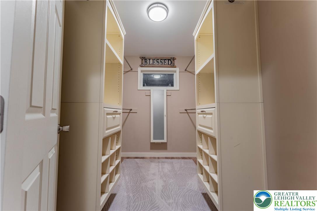 345 South Whitfield Street Nazareth, PA 18064 - Photo 18 of 29 a view of empty room with a fireplace and windows