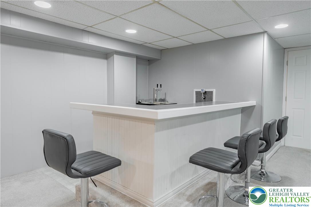 345 South Whitfield Street Nazareth, PA 18064 - Photo 22 of 29 a kitchen with a sink and a stove with chairs