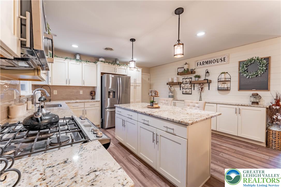 345 South Whitfield Street Nazareth, PA 18064 - Photo 5 of 29 a kitchen with a sink stove and refrigerator