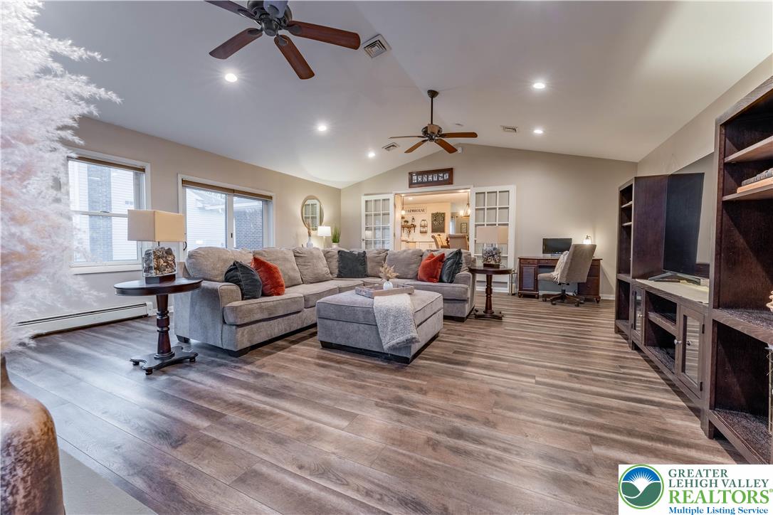 345 South Whitfield Street Nazareth, PA 18064 - Photo 9 of 29 a living room with furniture and a flat screen tv