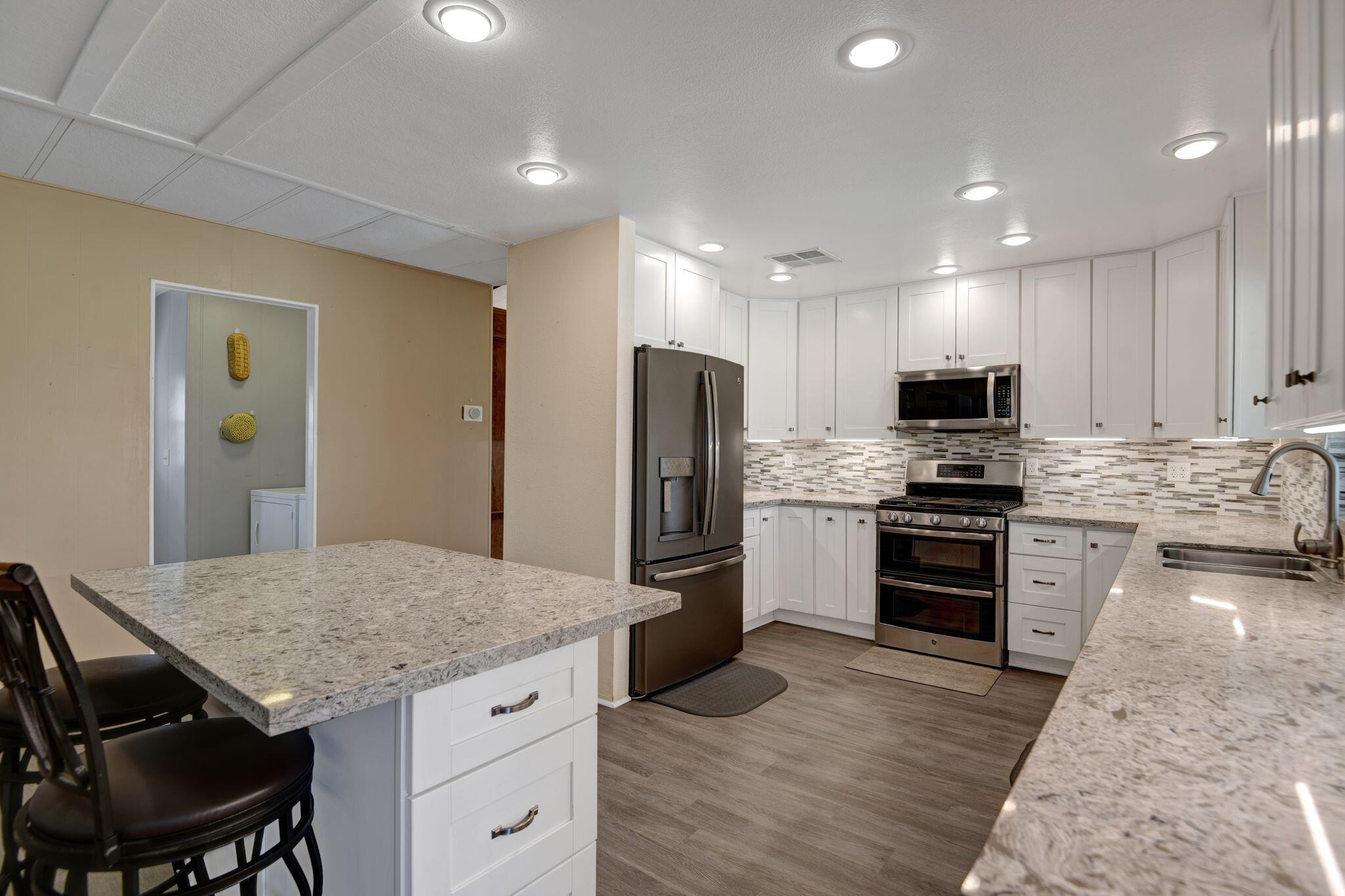 15500 Bubbling Wells Road, Unit 258 Desert Hot Springs, CA 92240 - Photo 1 of 33 258-kitchenbreakfastbar