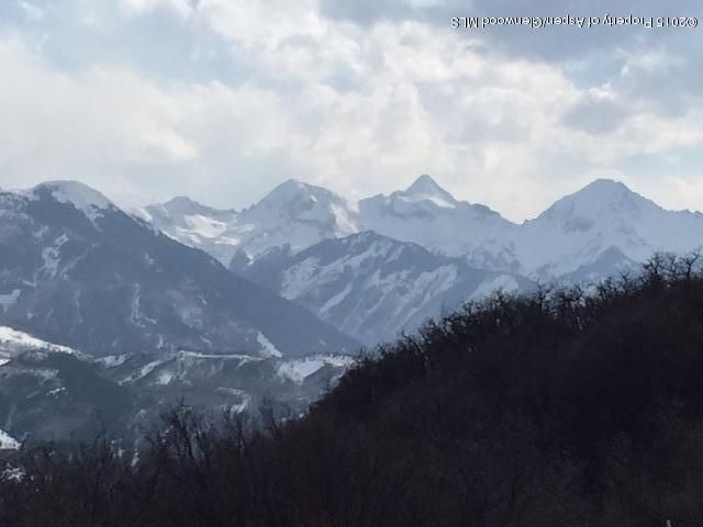 4000 Juniper Hill Road Aspen, CO 81611 - Photo 12 of 63 a view of a house with a mountain in the background