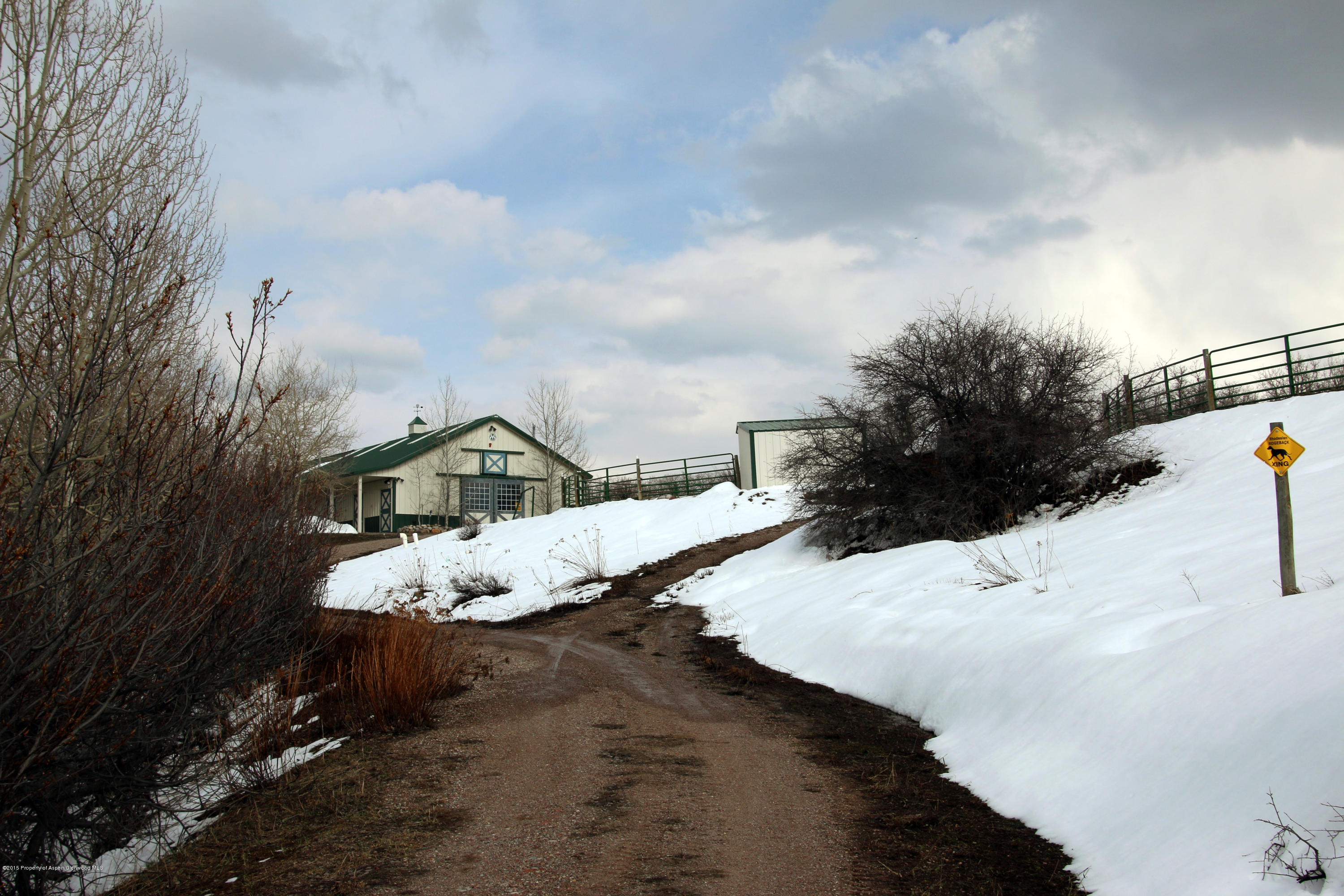 4000 Juniper Hill Road Aspen, CO 81611 - Photo 26 of 63 a view of a house with a snow in the background