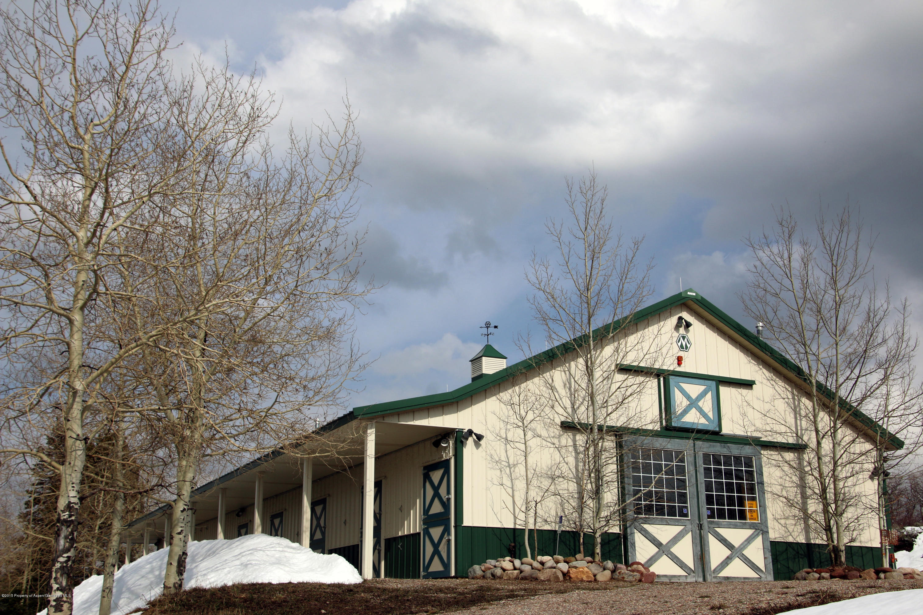 4000 Juniper Hill Road Aspen, CO 81611 - Photo 27 of 63 a view of wooden house with a large windows