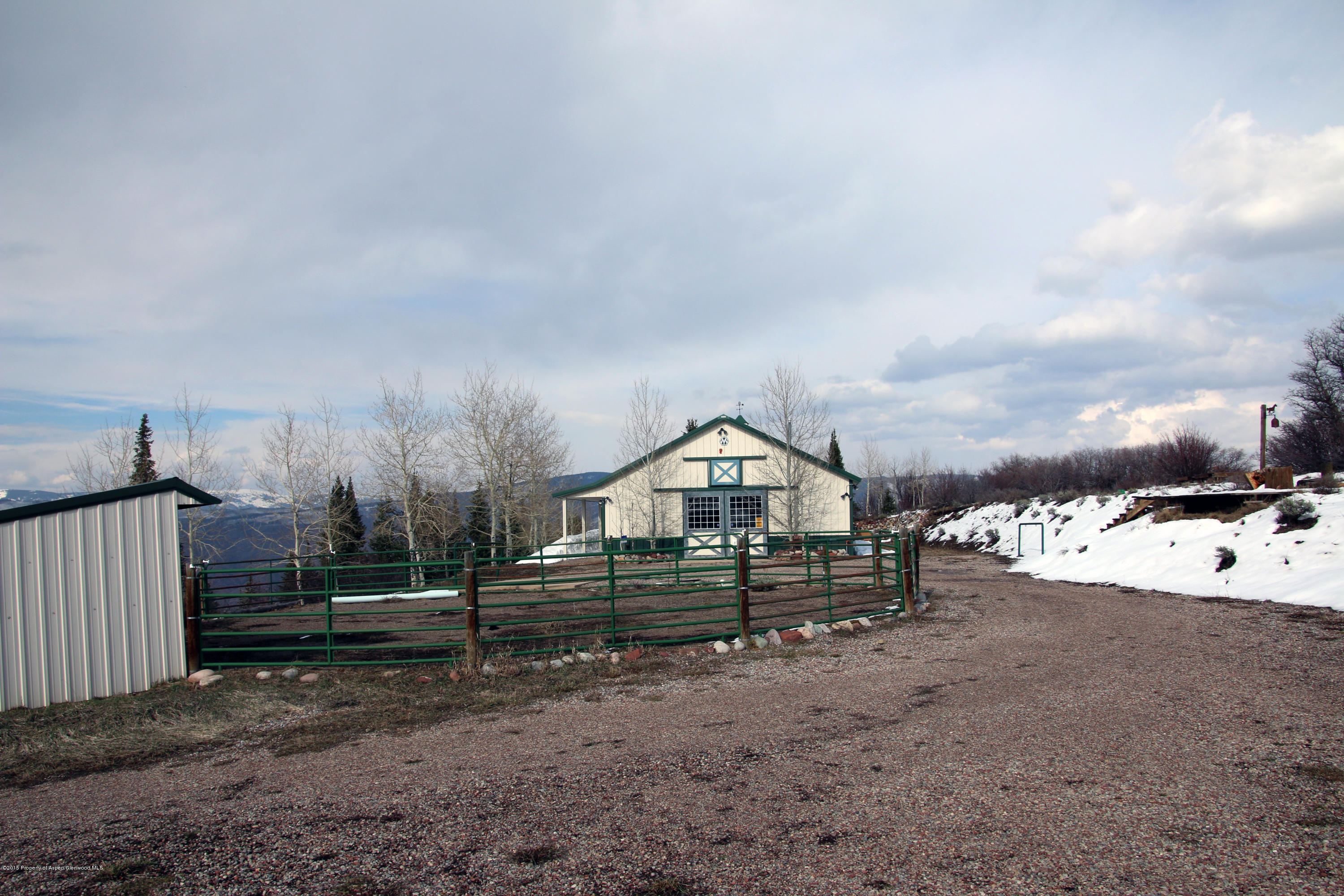 4000 Juniper Hill Road Aspen, CO 81611 - Photo 39 of 63 a view of a house with a yard
